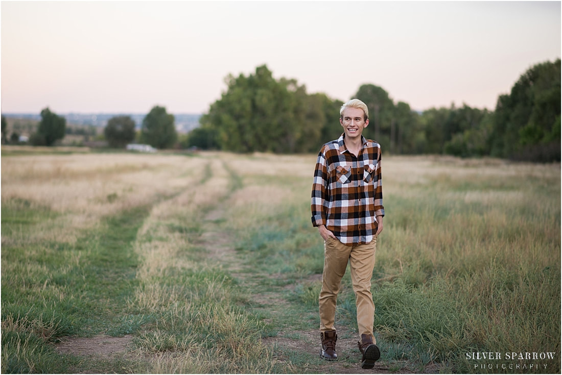 high school senior photographers littleton colorado - sunset - flannel - walking and laughing